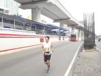 pelari-electric-jakarta-marathon-melintasi-jalur-cepat-jalan-hr-rasuna-said_20181028_100029.jpg