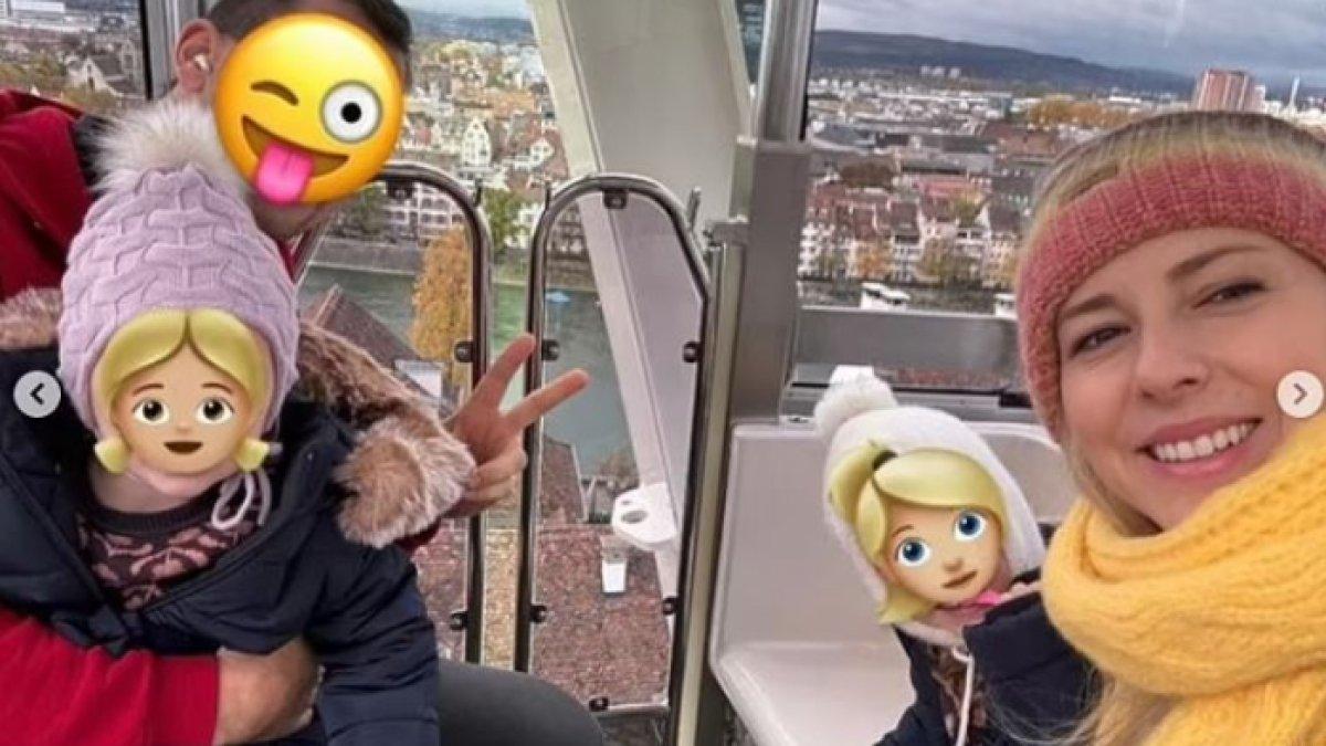 Foto liburan Kristina bersama suami dan anaknya di sebuah hotel di atas Danau Lucerne.